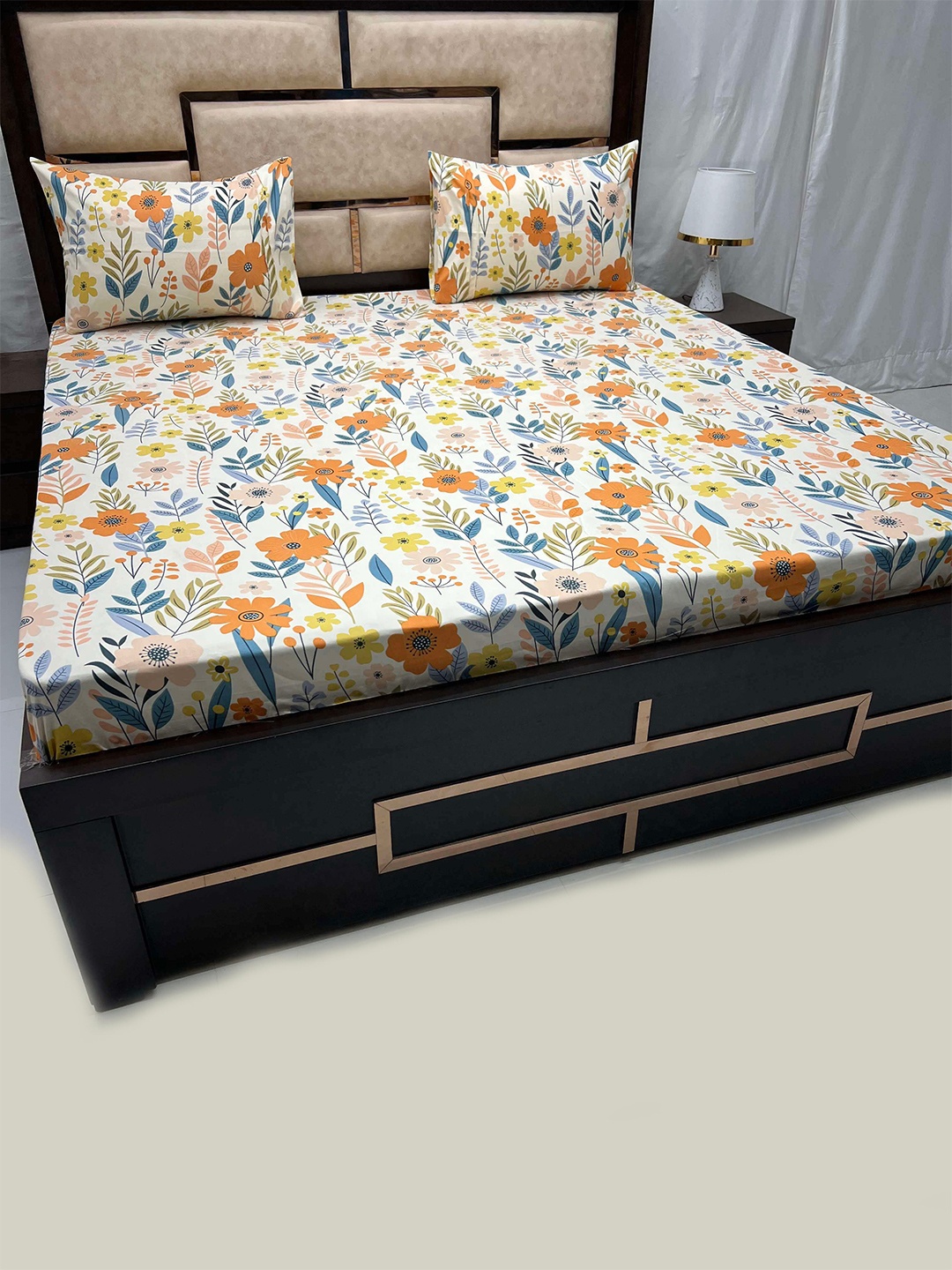 

Pure Decor White & Orange Floral Printed 250 TC King Bedsheet with 2 Pillow Covers