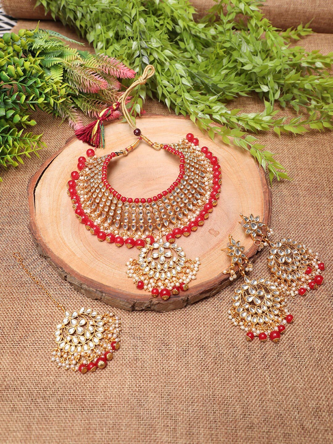 

Swarajshop Gold-Plated Kundan-Studded & Beaded Jewellery Set, Orange
