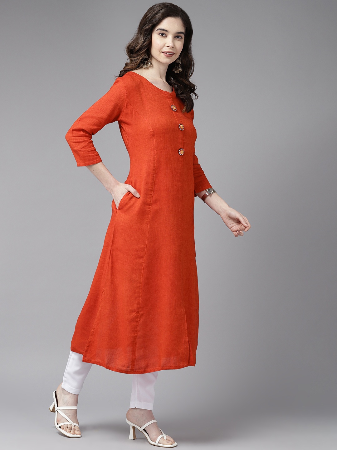 

Aarika Women Solid Cotton Kurta, Orange