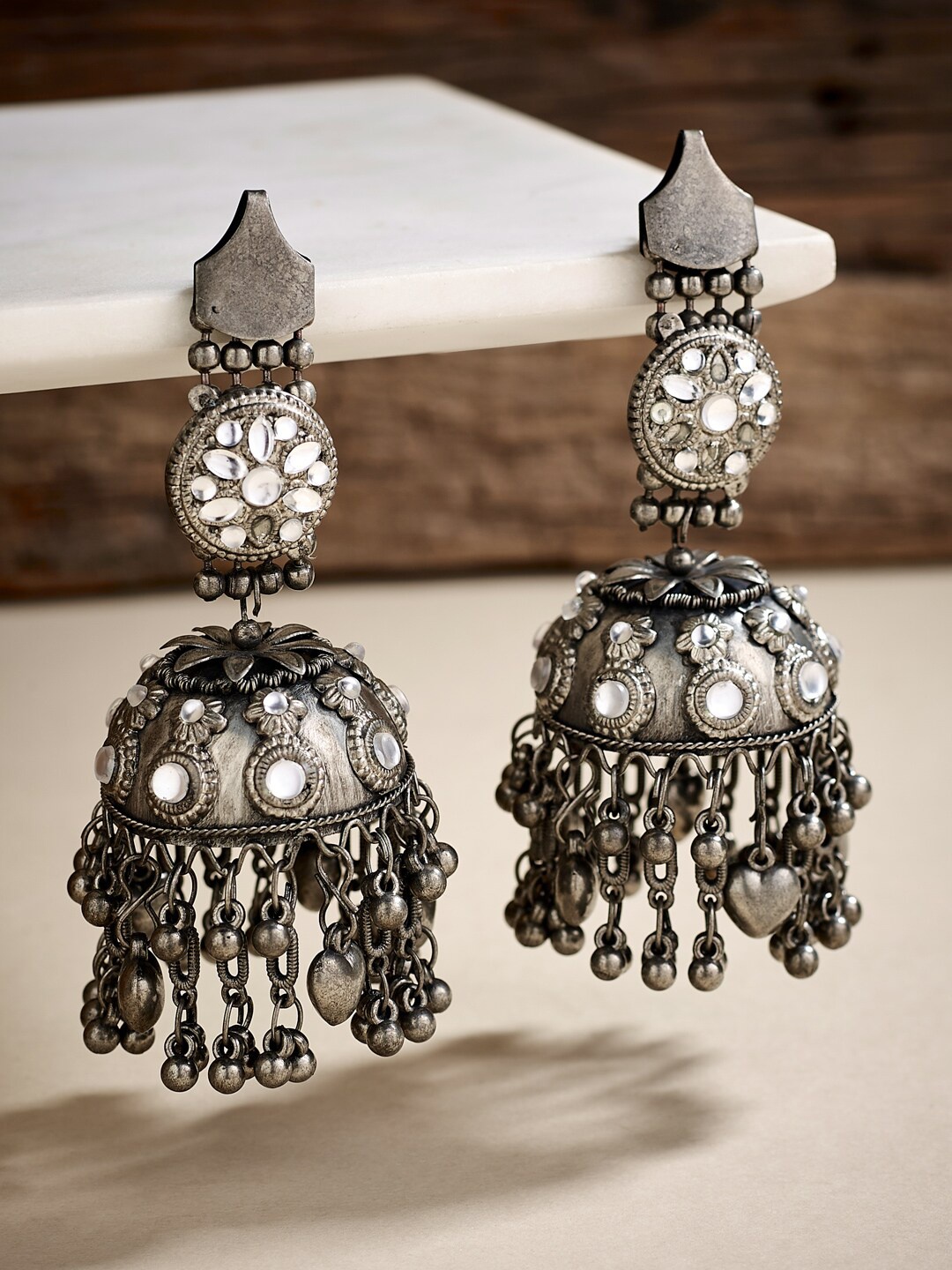 

ATIBELLE Stone Studded Gold-Plated Dome Shaped Jhumkas Earrings, Silver