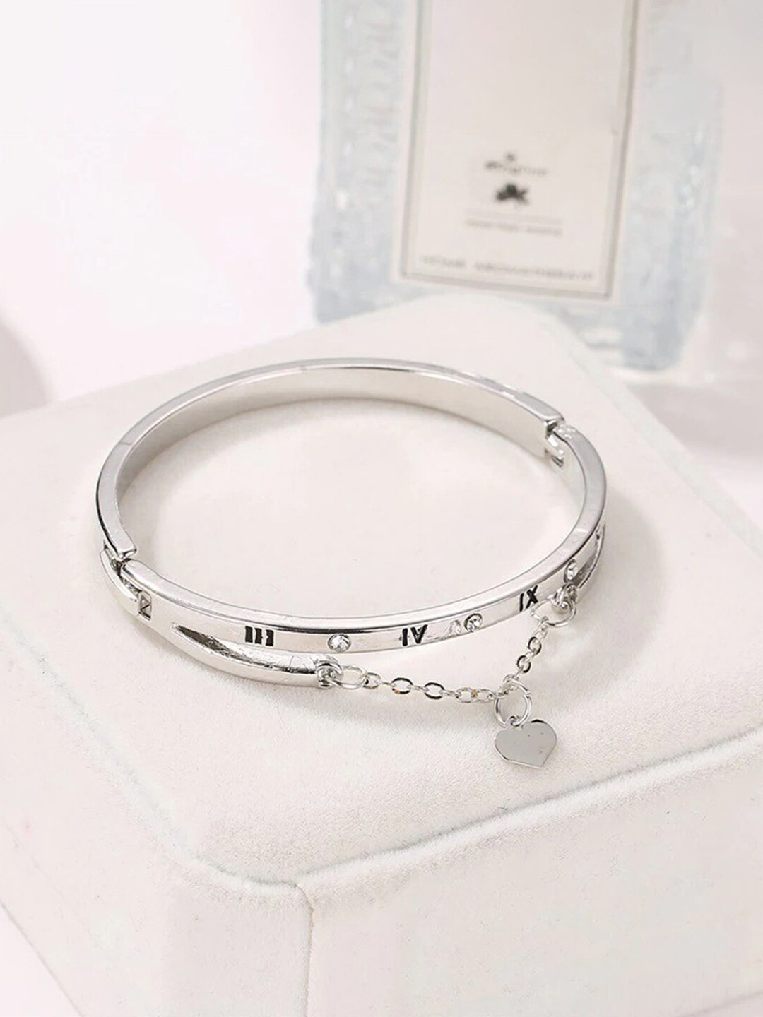 

Jewels Galaxy Women Brass Silver-Plated Bangle-Style Bracelet