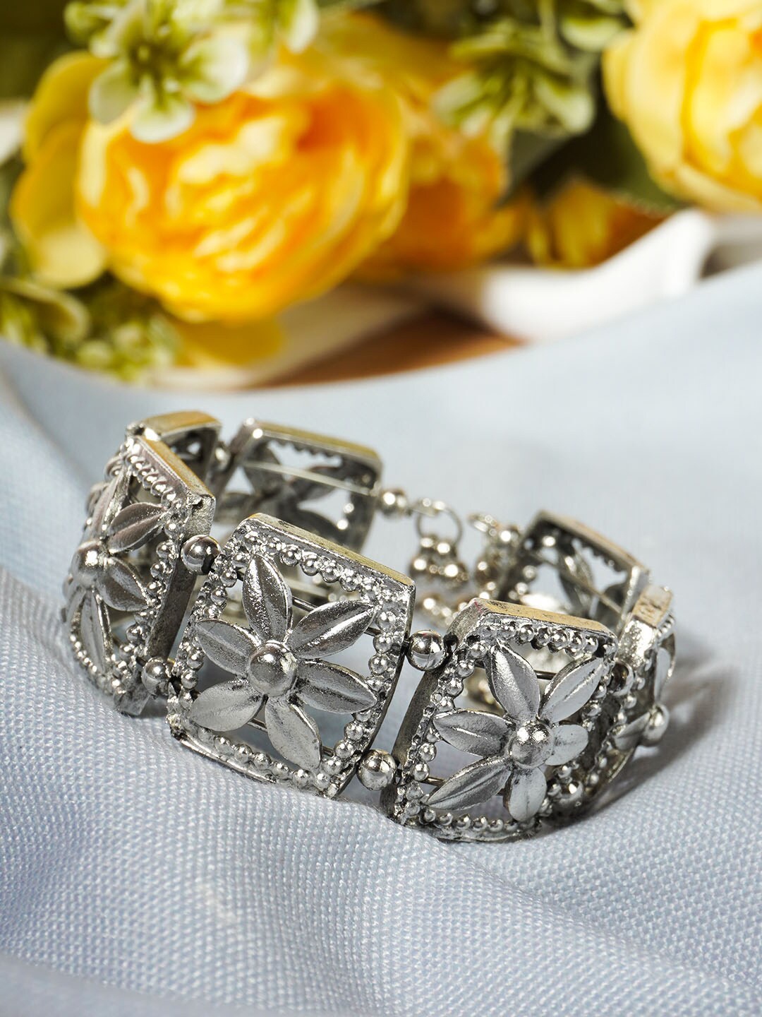 

Urmika Women Silver-Toned Cuff Bracelet