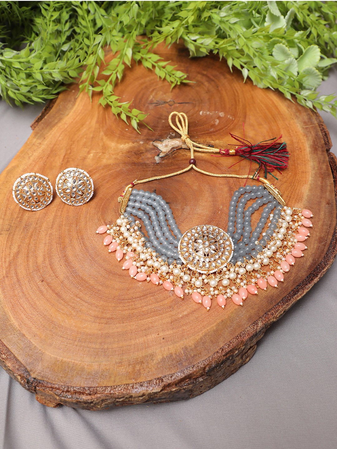 

Swarajshop Gold-Plated Kundan-Studded & Pearl-Beaded Choker Jewellery Set