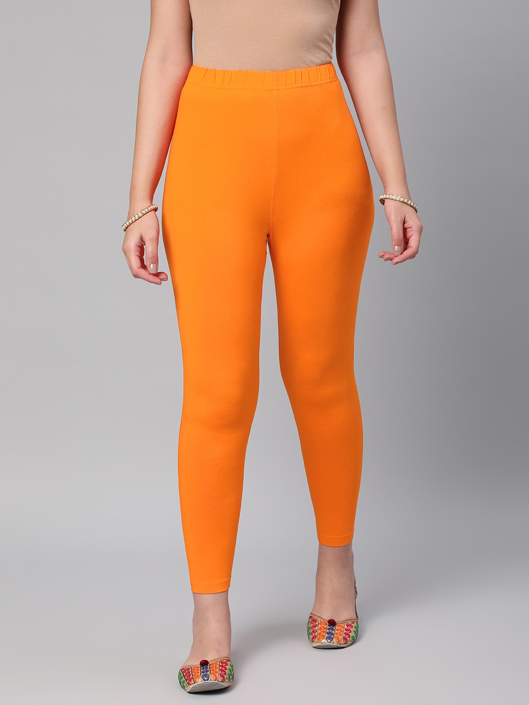 

Huetrap Women Solid Ankle Length Leggings, Orange