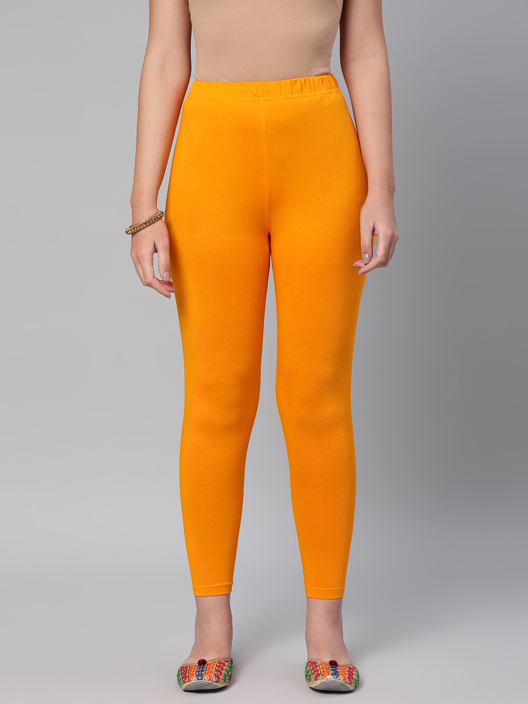 

Huetrap Women Solid Ankle Length Leggings, Orange