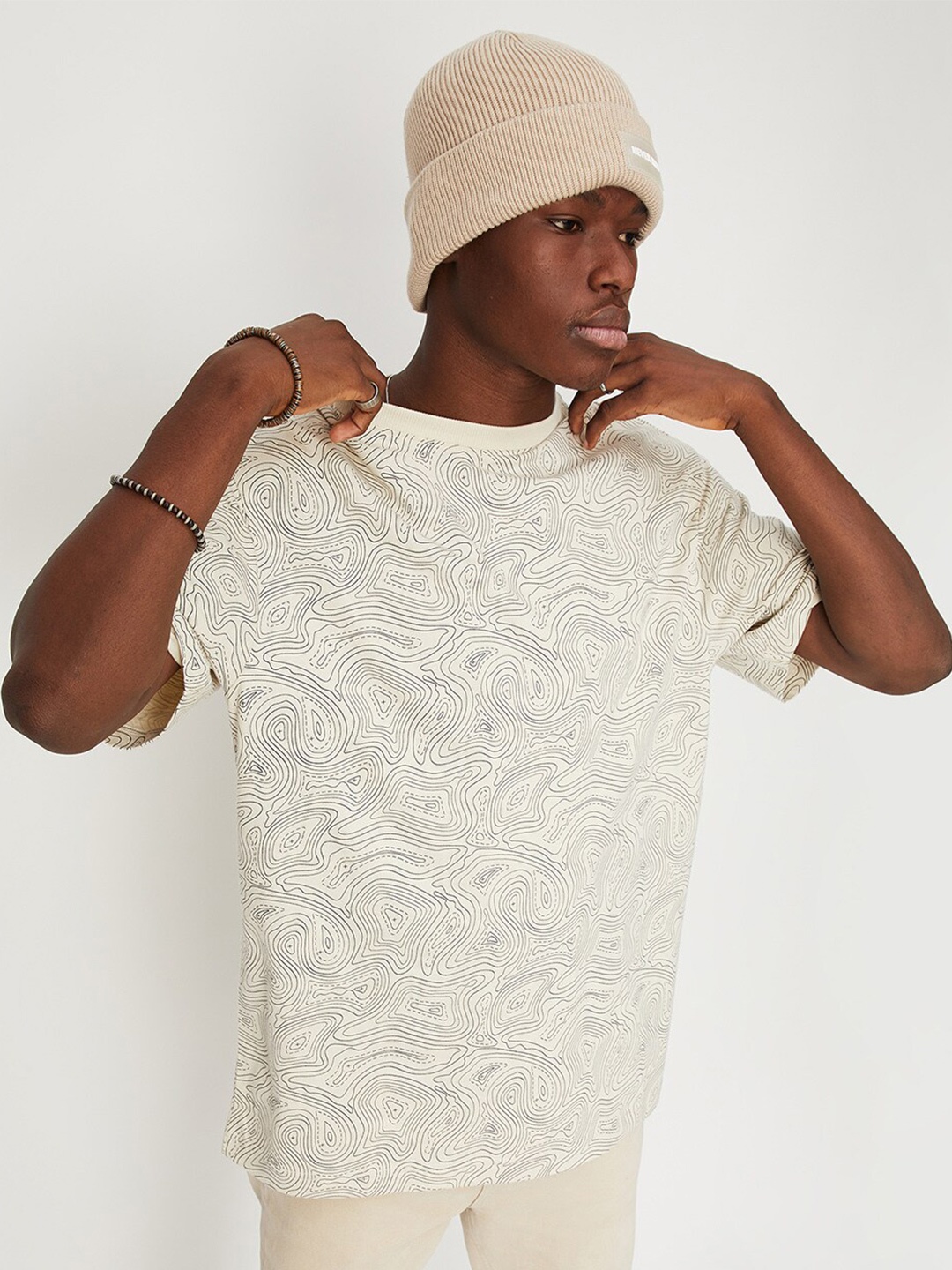 

max Men Printed Drop-Shoulder Sleeves Oversized Pure Cotton T-shirt, Beige