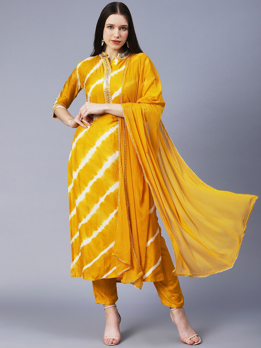 

FASHOR Women Leheriya Dyed Sequinned Kurta With Trousers & Dupatta, Mustard
