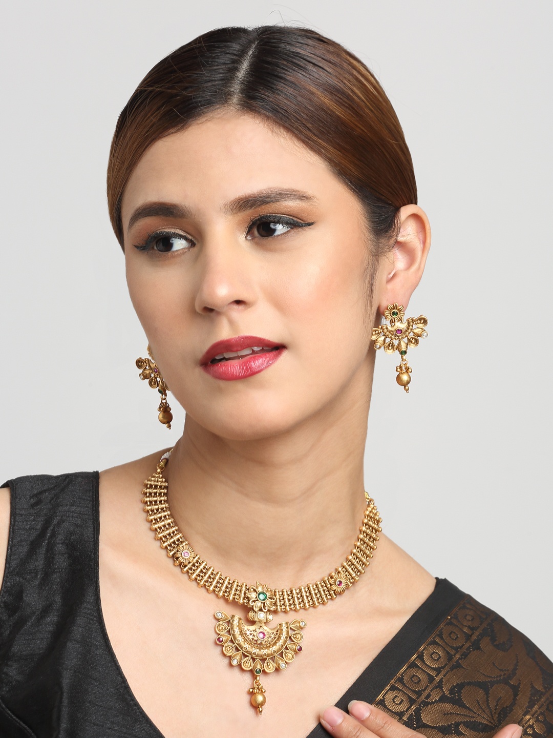 

YouBella Gold-Plated Stone Studded Jewellery Set
