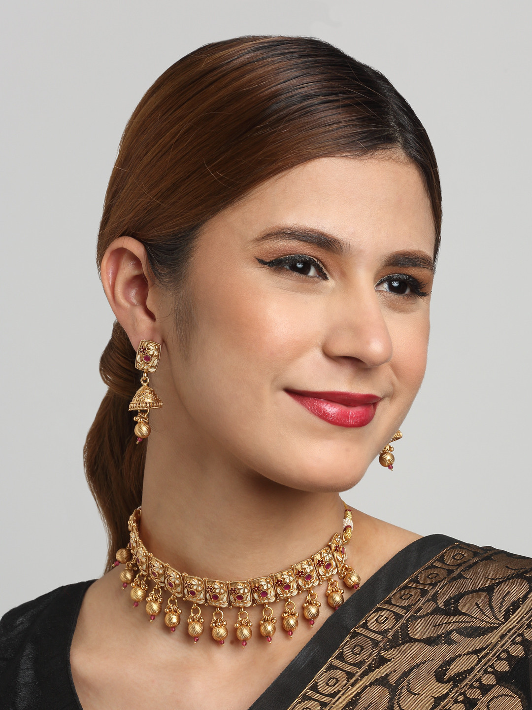 

YouBella Gold-Plated Stone-Studded Antique Choker Jewellery Set