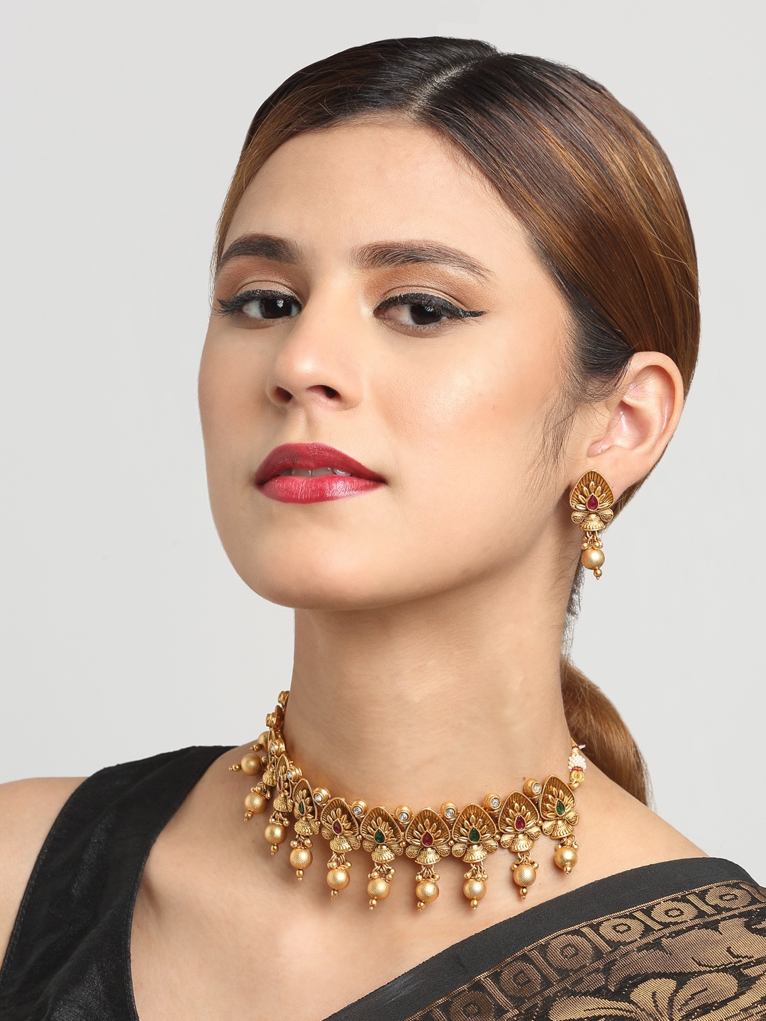 

YouBella Gold-Plated Stone-Studded & Beaded Jewellery Set