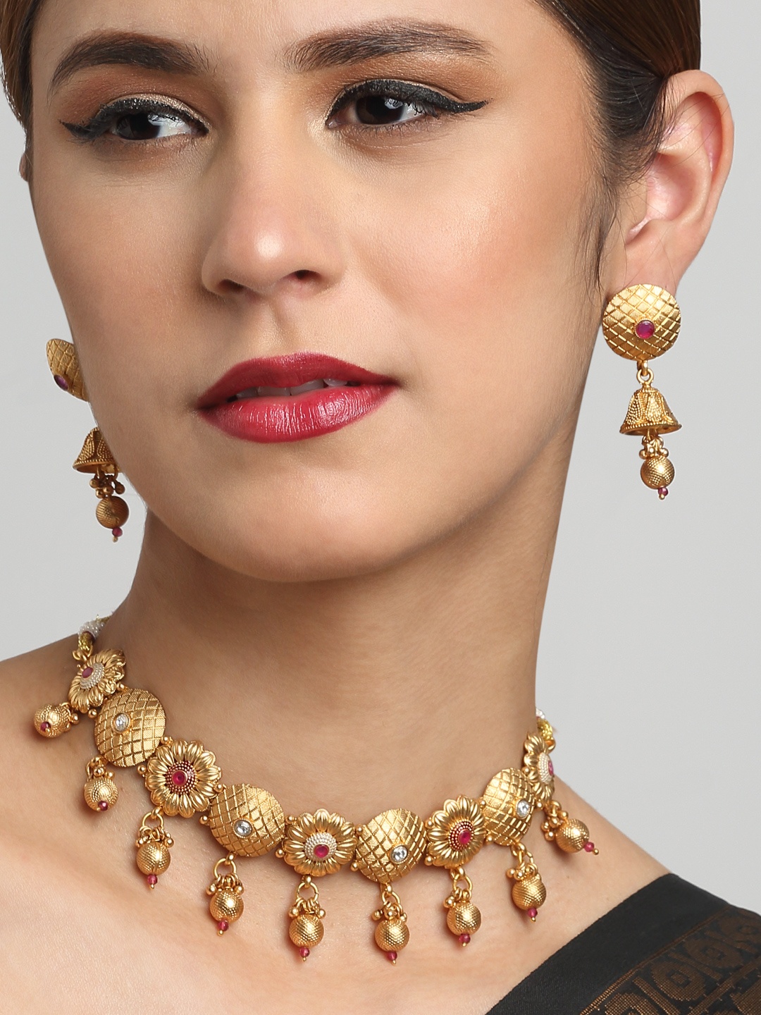 

YouBella Gold-Plated Stone Studded Textured Alloy Jewellery Set