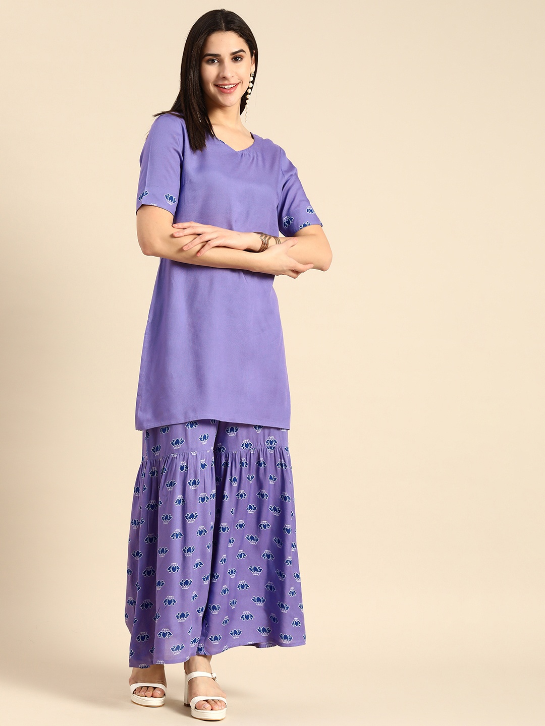

Anouk Women Solid Round Neck Kurta with Floral Printed Sharara, Violet