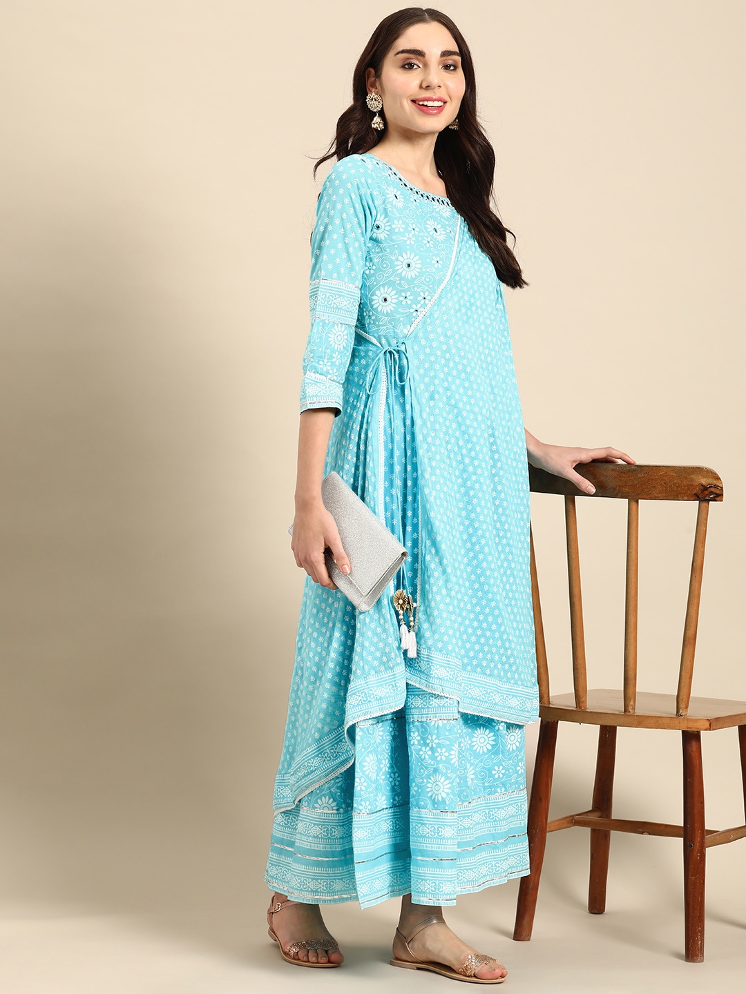 

Sangria Women Floral Embroidered Mirror Work Angrakha Kurta, Turquoise blue
