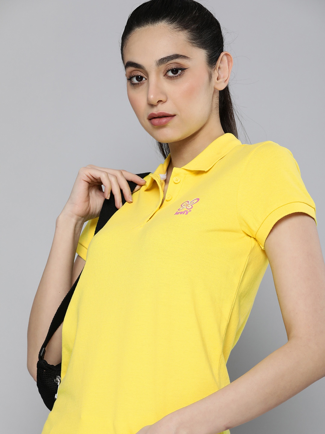 

Levis Women Pure Cotton Solid Polo Collar T-shirt With Brand Logo Detail, Yellow
