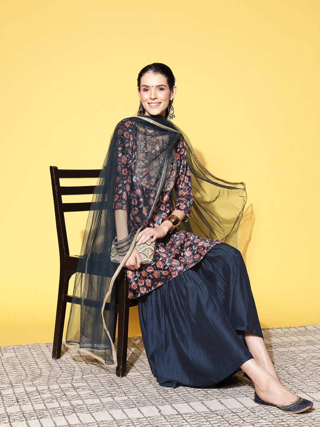 

Sunehri Women Floral Embroidered Velvet Kurti With Sharara & With Dupatta, Navy blue