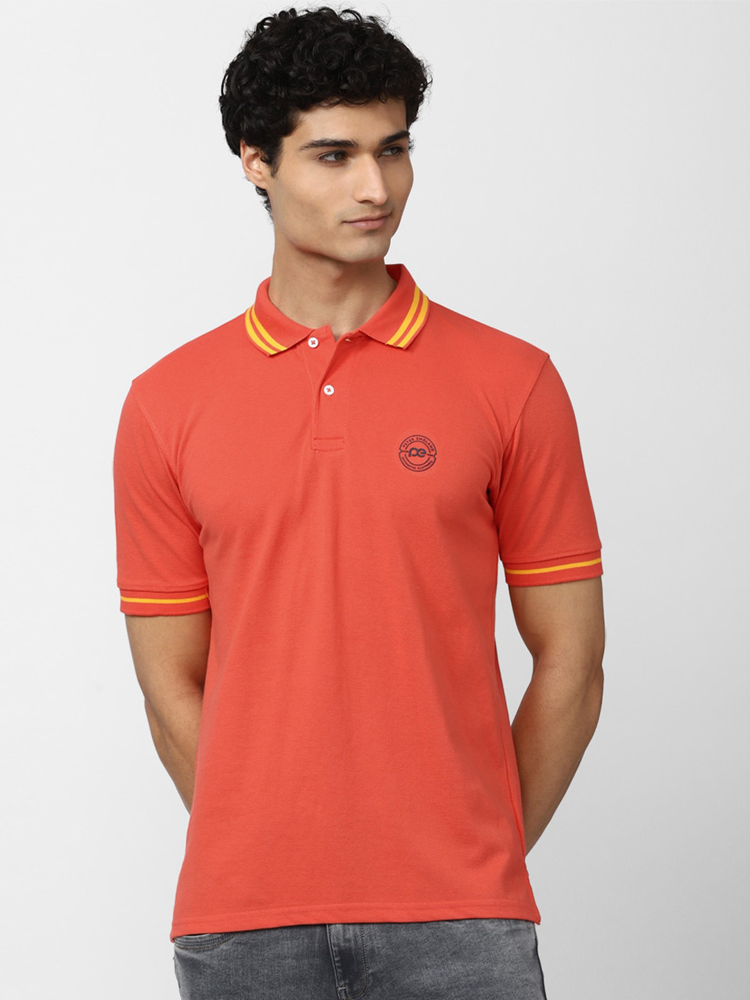

Peter England Men Polo Collar T-shirt, Orange