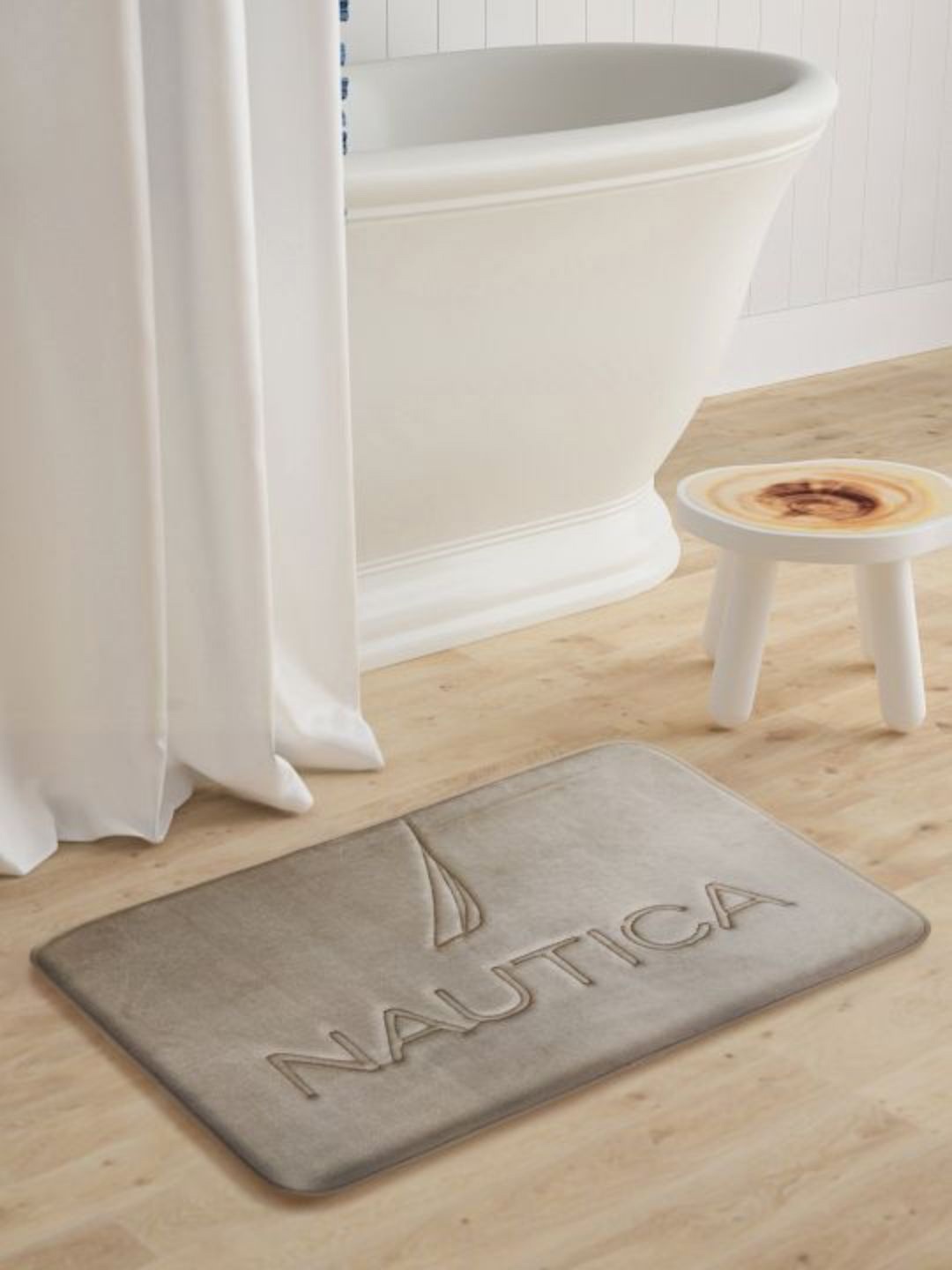 

Nautica Camel Brown Self Design With Brand Logo Memory Form Non-Skid Bath Rug