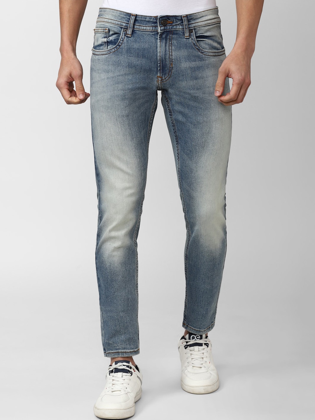 

Peter England Casuals Men Skinny Fit Heavy Fade Jeans, Blue