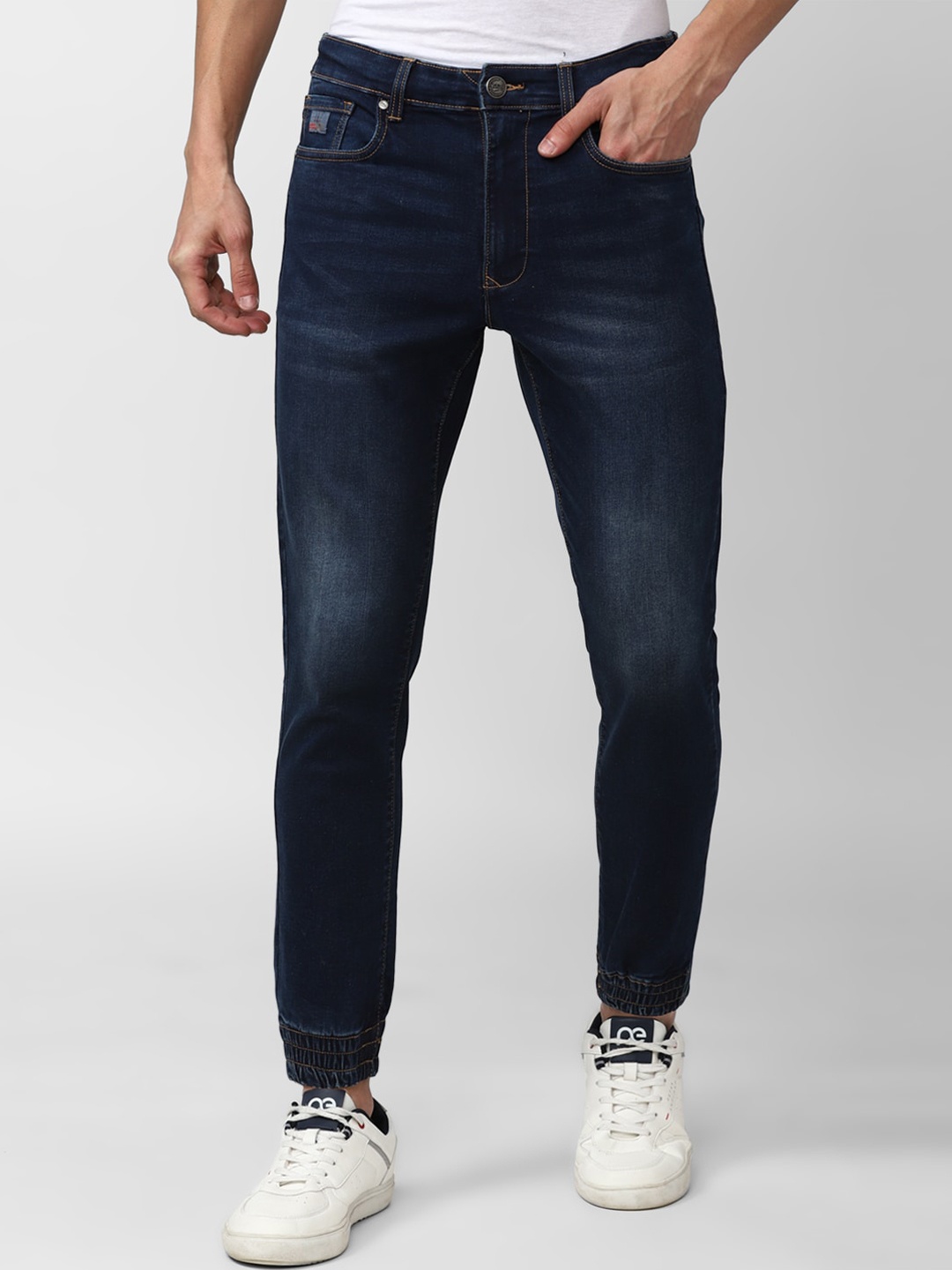 

Peter England Casuals Men Solid Slim Fit Light Fade Jeans, Navy blue