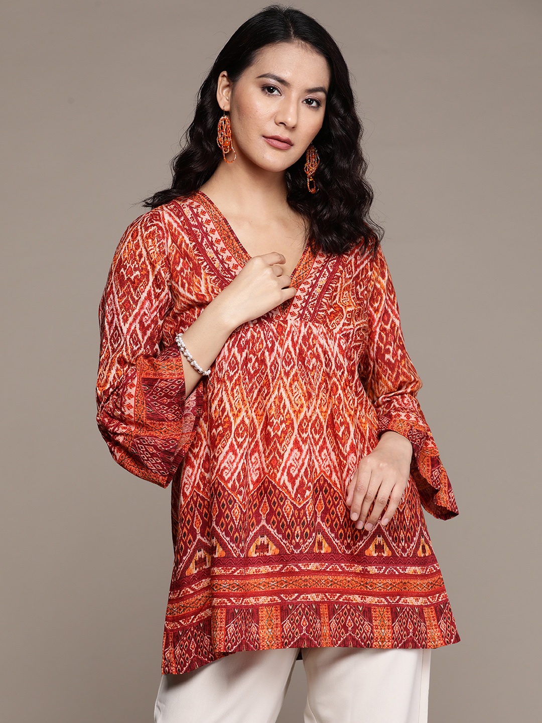 

aarke Ritu Kumar Printed V-Neck Longline Top, Rust