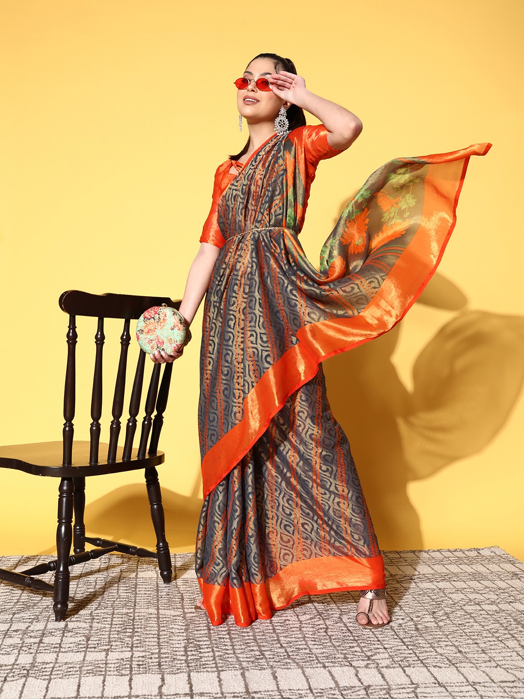 

Mitera Grey & Orange Ethnic Motifs Phulkari Brasso Block Print Saree