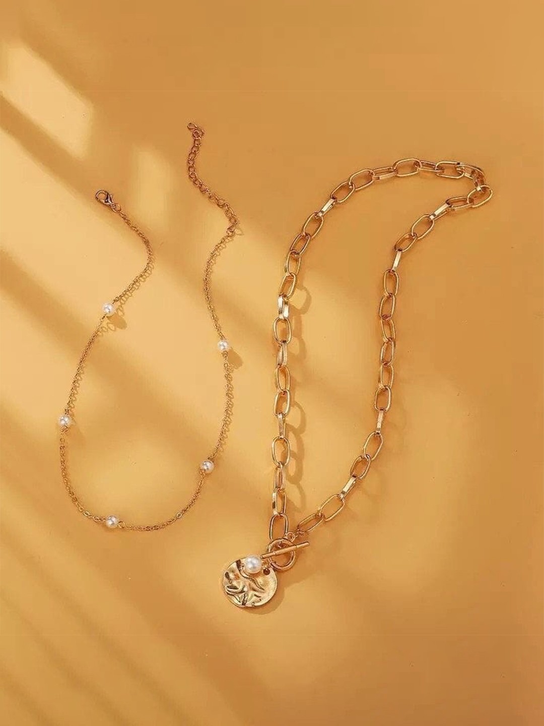 

Inaya Pack of 2 Copper-Plated Necklace