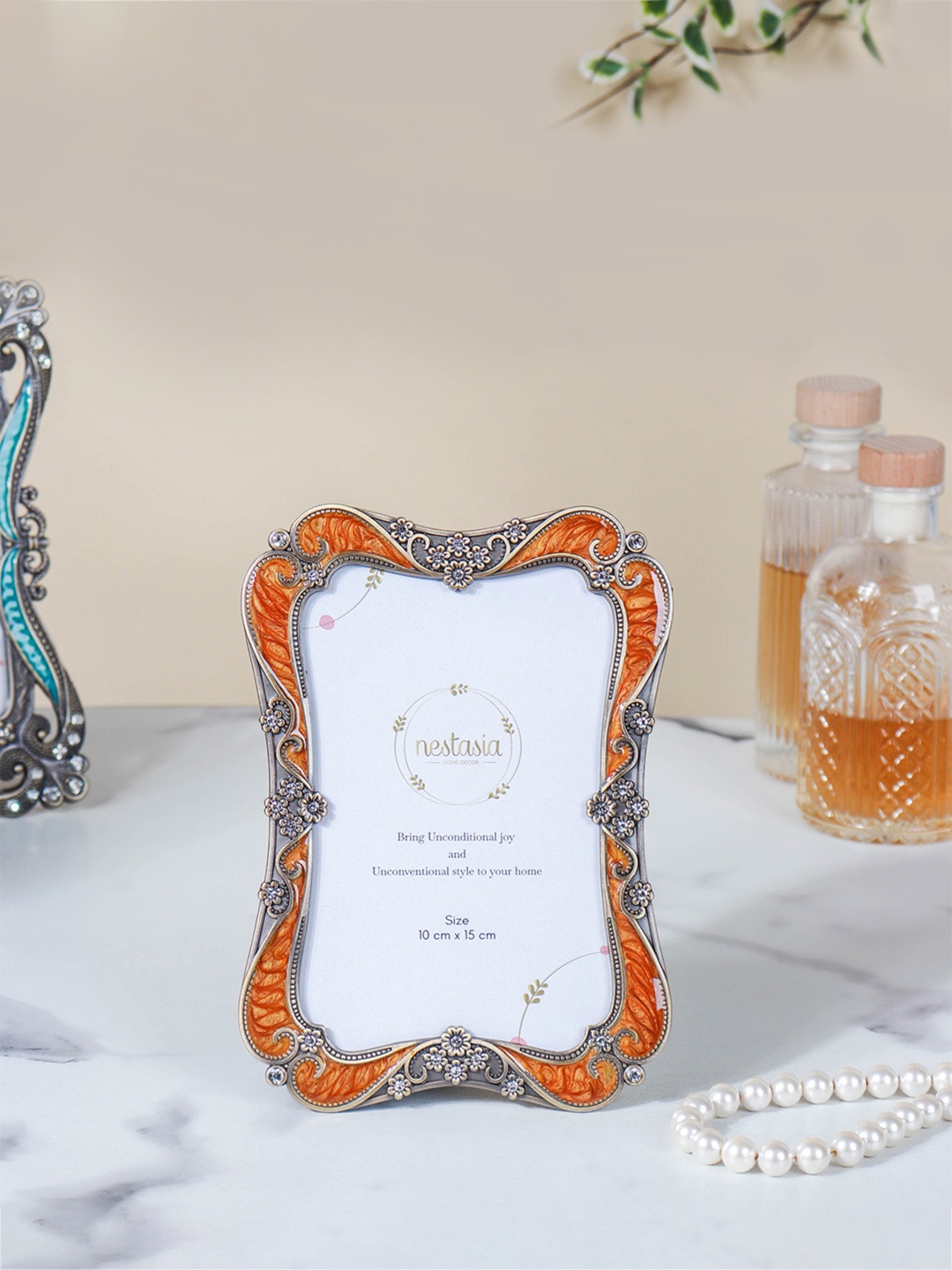 

Nestasia Heirloom Orange Coloured & Silver-Toned Photo Frame