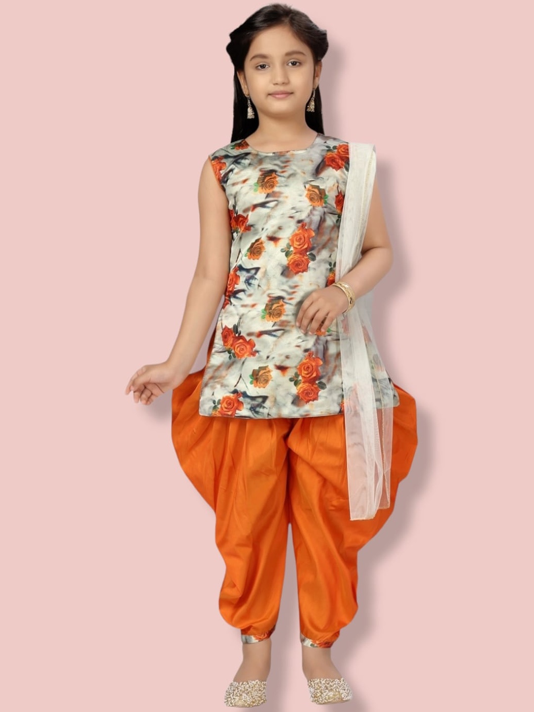 

Aarika Girls Floral Printed Pure Silk Kurti with Dhoti Pants & With Dupatta, Orange