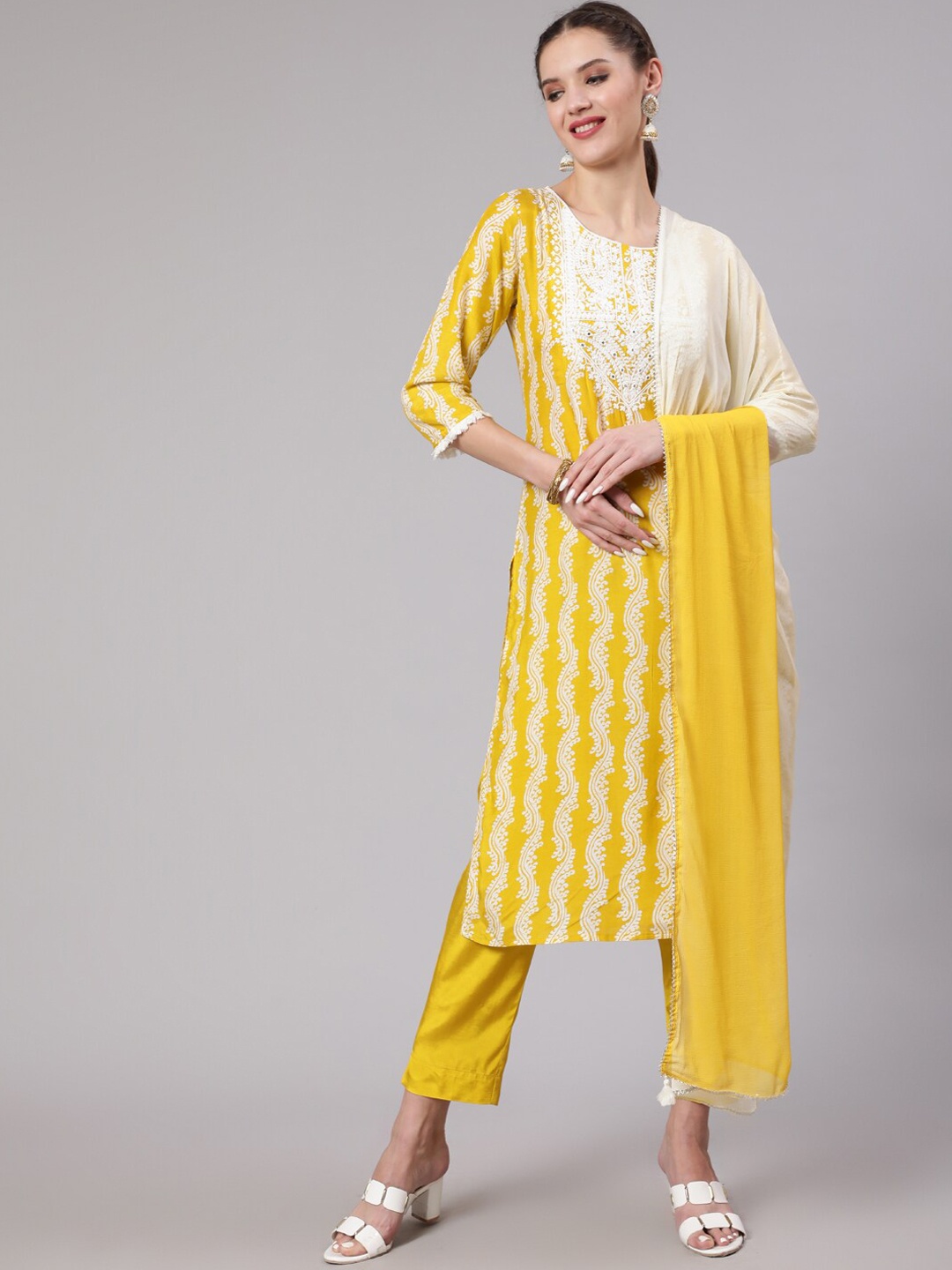 

Nehamta Women Ethnic Motifs Printed Thread Work Kurta with Trousers & Dupatta, Yellow