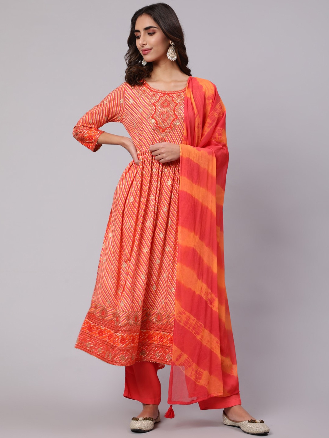 

Nehamta Women Leheriya Printed Thread Work Kurta with Trousers & With Dupatta, Orange