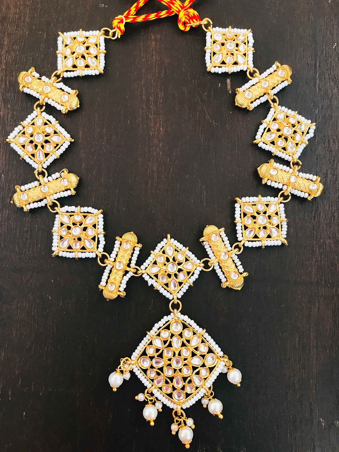 

The Opal Factory Gold-Plated Stone-Studded & Pearl Beaded Sheeshphool