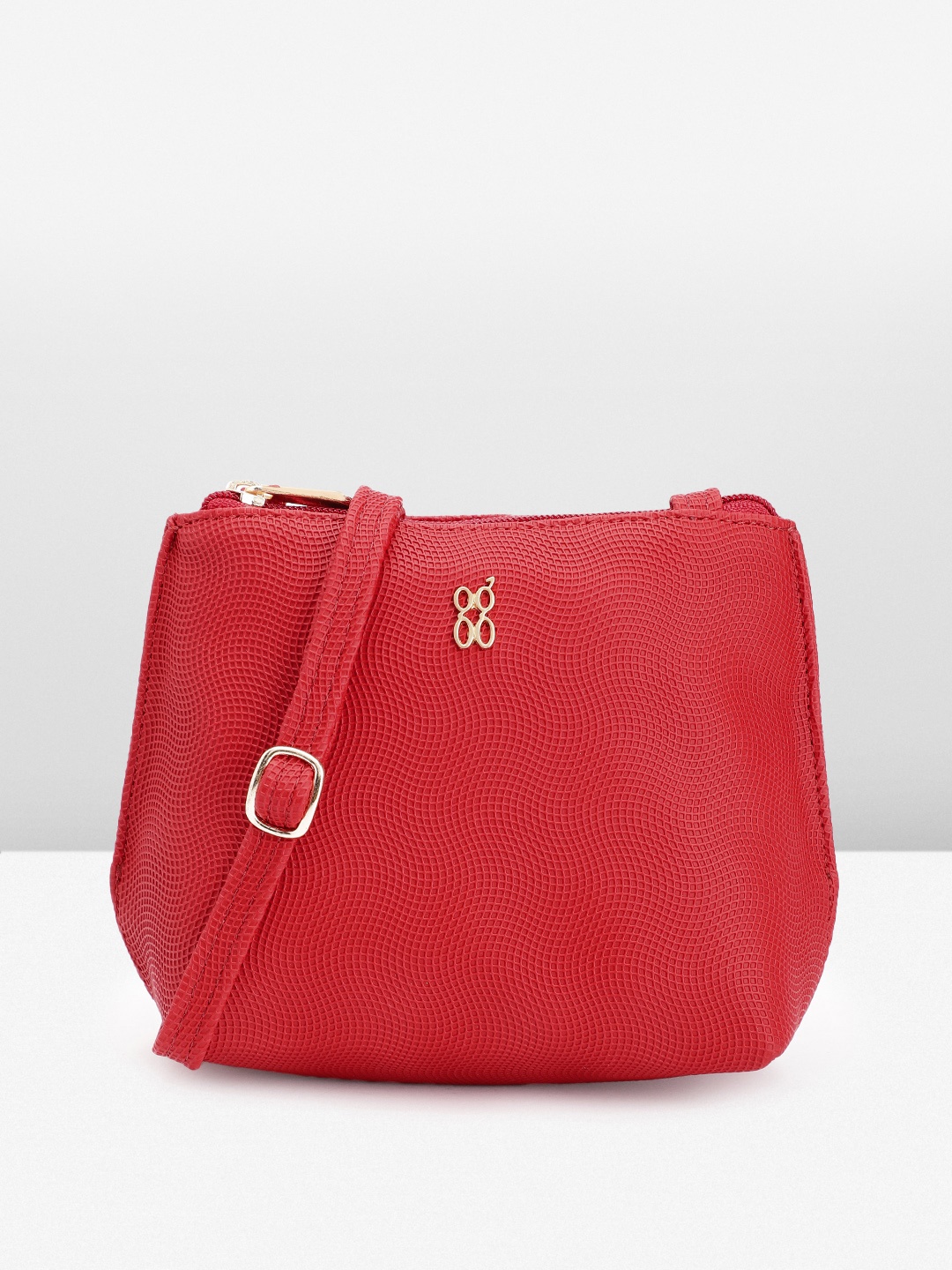 

Baggit Textured Sling Bag, Red