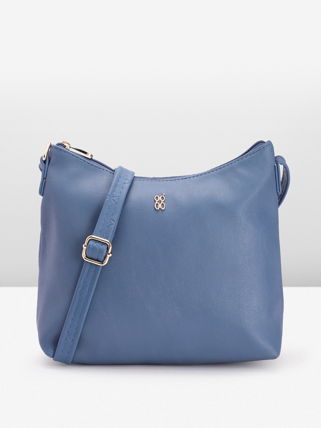 

Baggit Star Design Structured Sling Bag, Blue