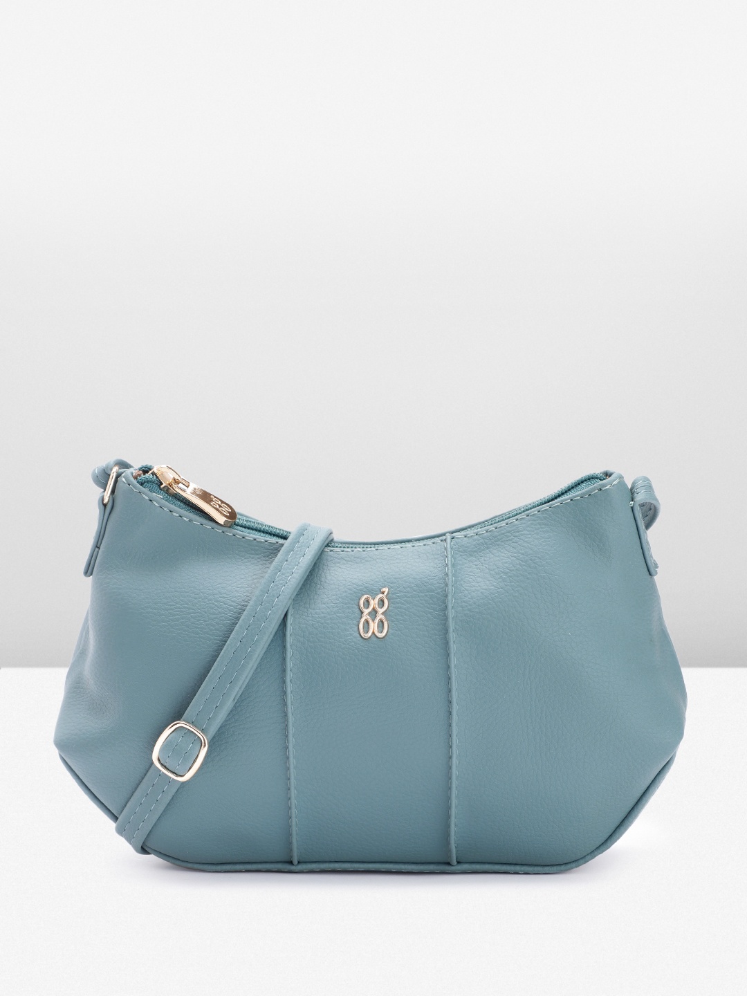 

Baggit Women Solid Sling Bag, Blue