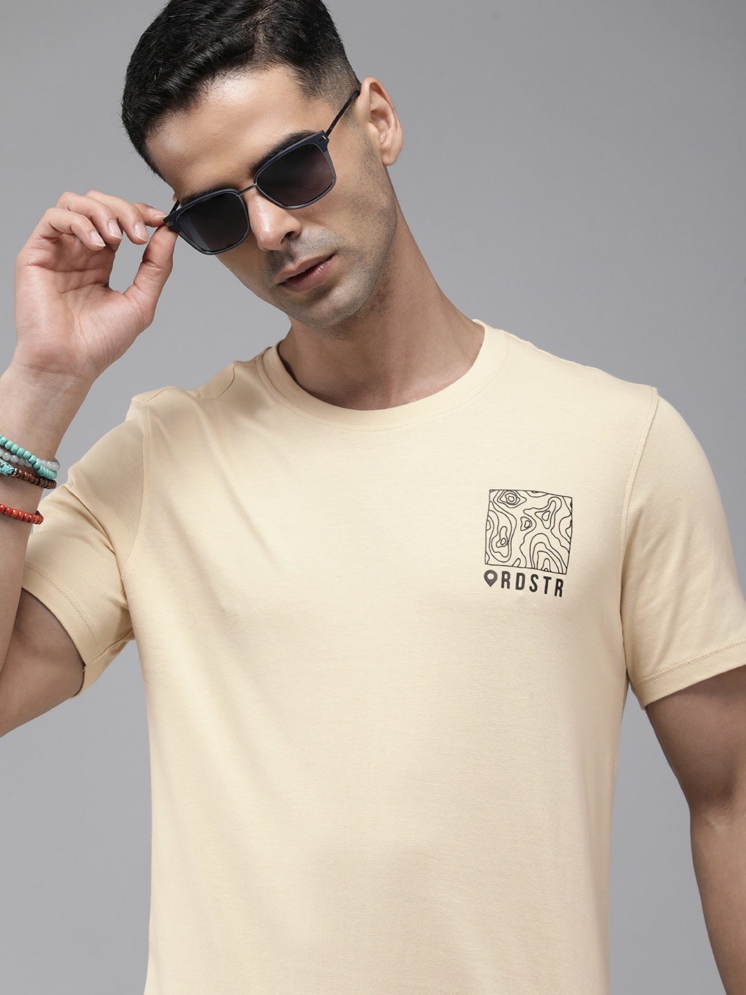 

The Roadster Lifestyle Co. Men Pure Cotton Solid Casual T-shirt With Printed Detail, Beige
