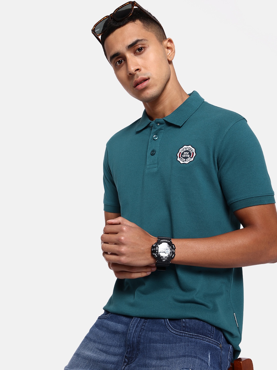 

The Roadster Lifestyle Co. Men Solid Polo Collar Pure Cotton T-shirt, Blue