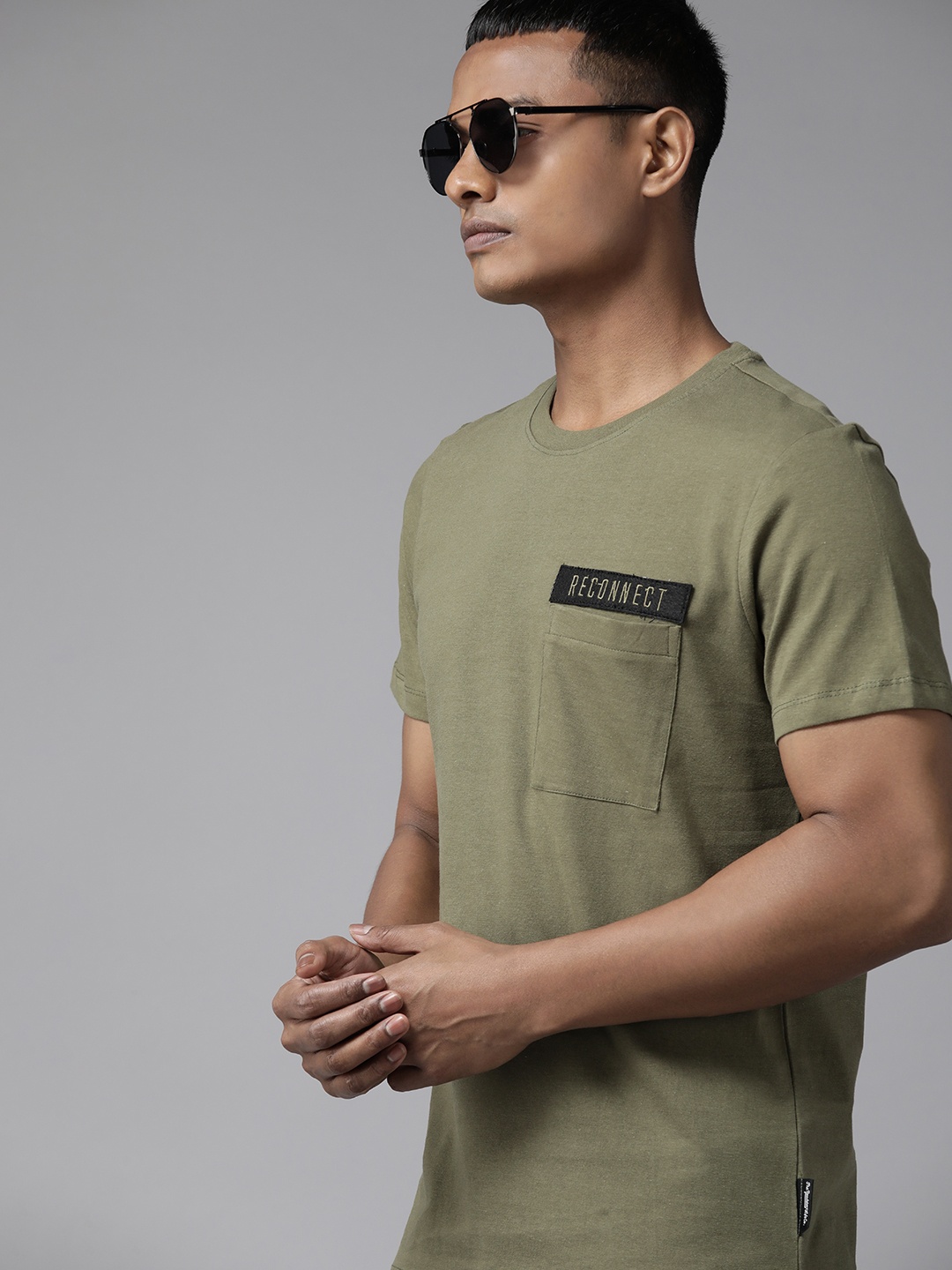 

The Roadster Lifestyle Co. Men Solid Pure Cotton T-shirt, Olive