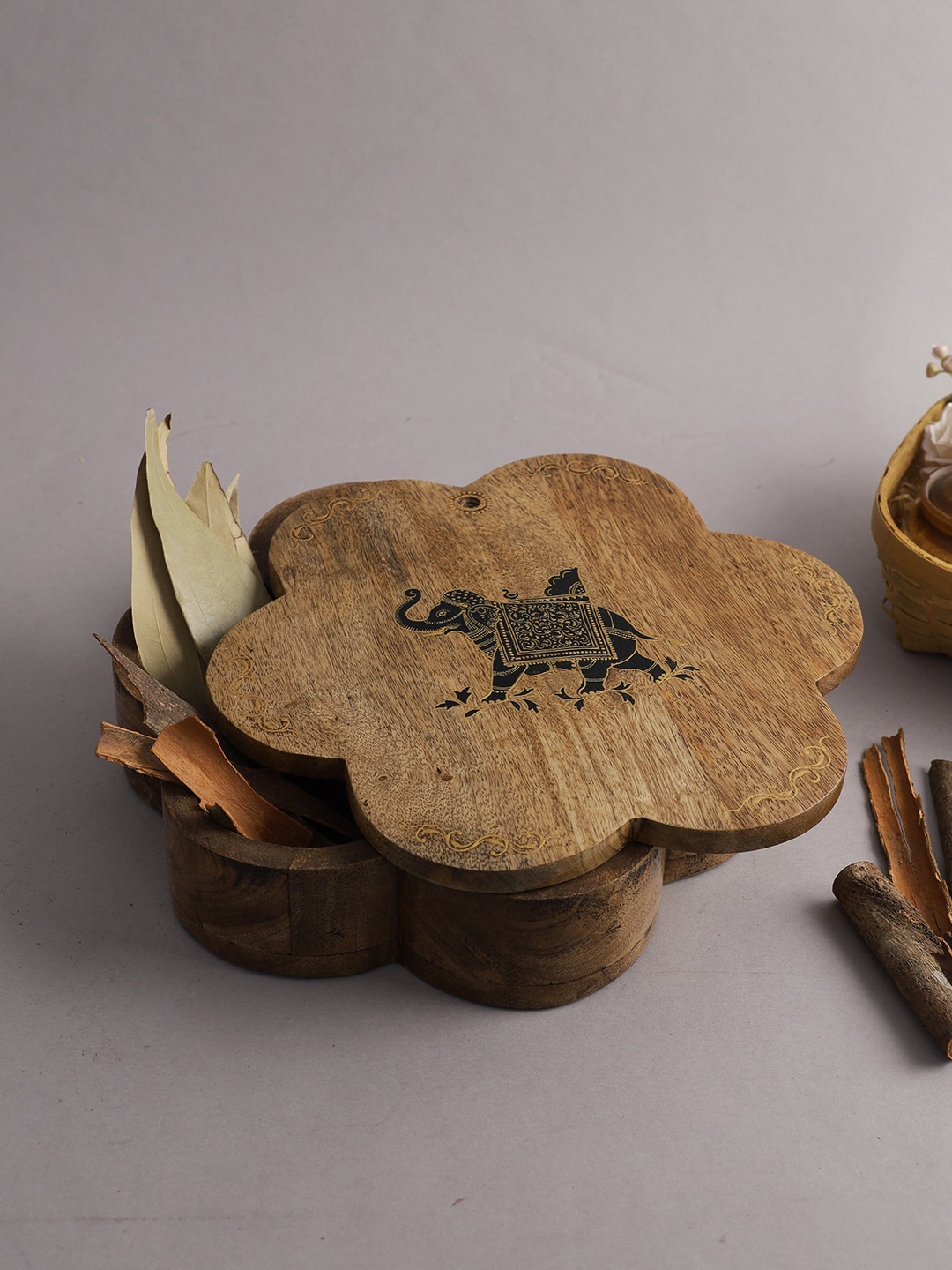 

Aapno Rajasthan Brown Engraved Elephant Design Handcrafted Wooden Spice Box