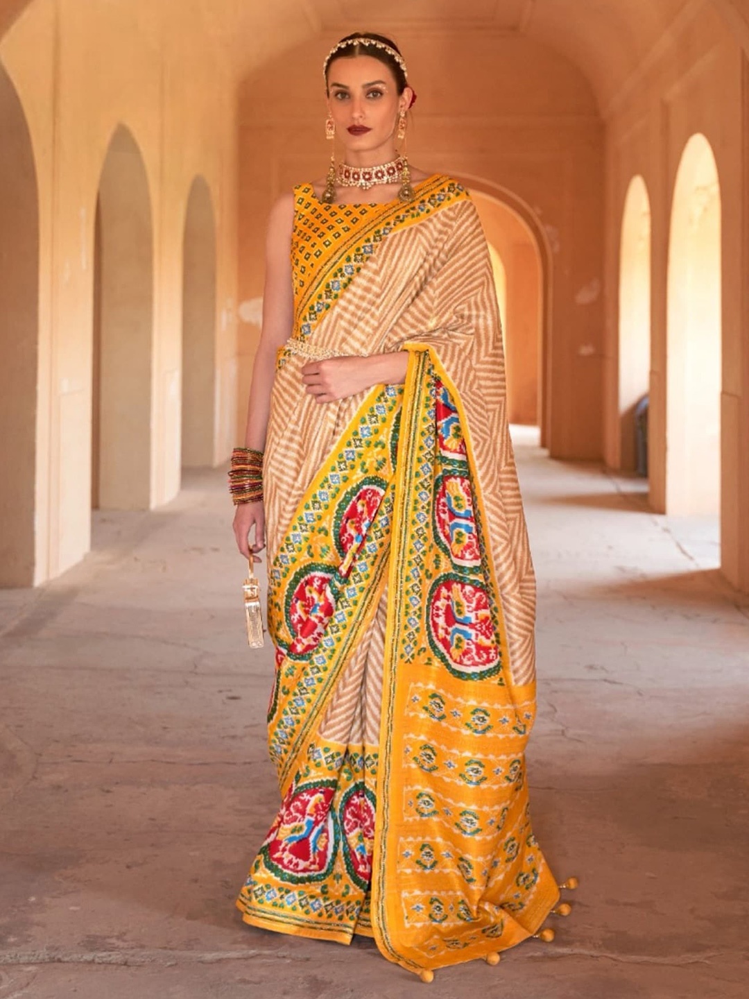 

Mitera Ethnic Motifs printed Pure Silk Patola Saree, Yellow