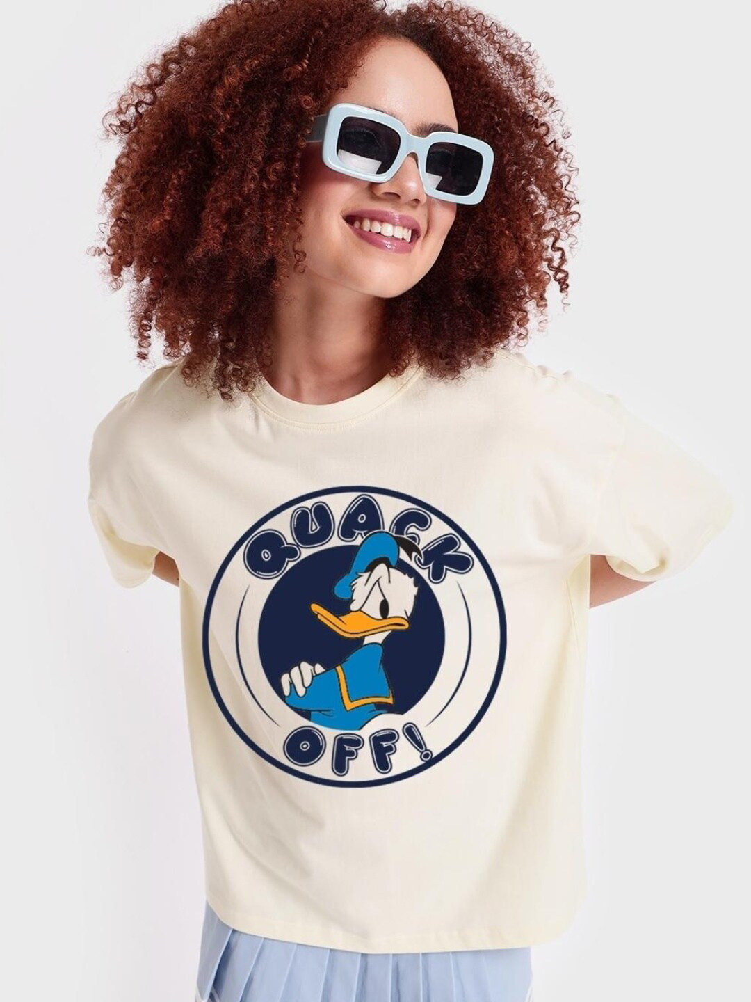 

Bewakoof Women Donald Duck Printed Loose Cotton T-shirt, Cream