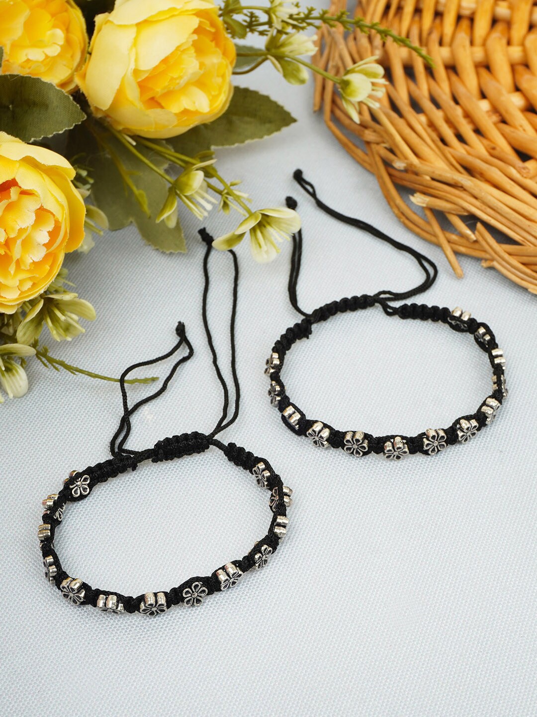 

Urmika Set of 2 Silver-Plated Floral Thread Oxidised Anklets