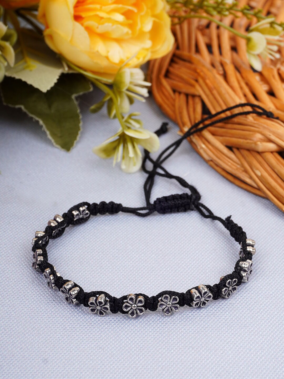 

Urmika Floral Shaped Thread Anklets, Silver