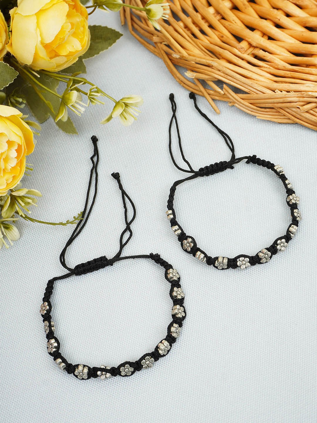

Urmika Set of 2 Silver-Plated Floral Thread Oxidised Anklets