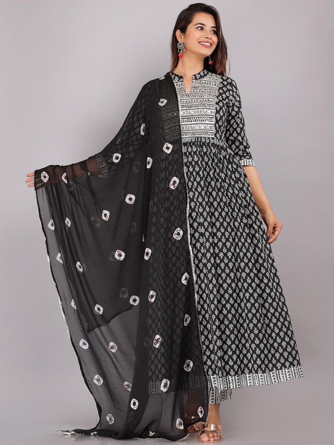 

KALINI Women Floral Printed Pleated Sequinned Kurta with Trousers & Dupatta, Black