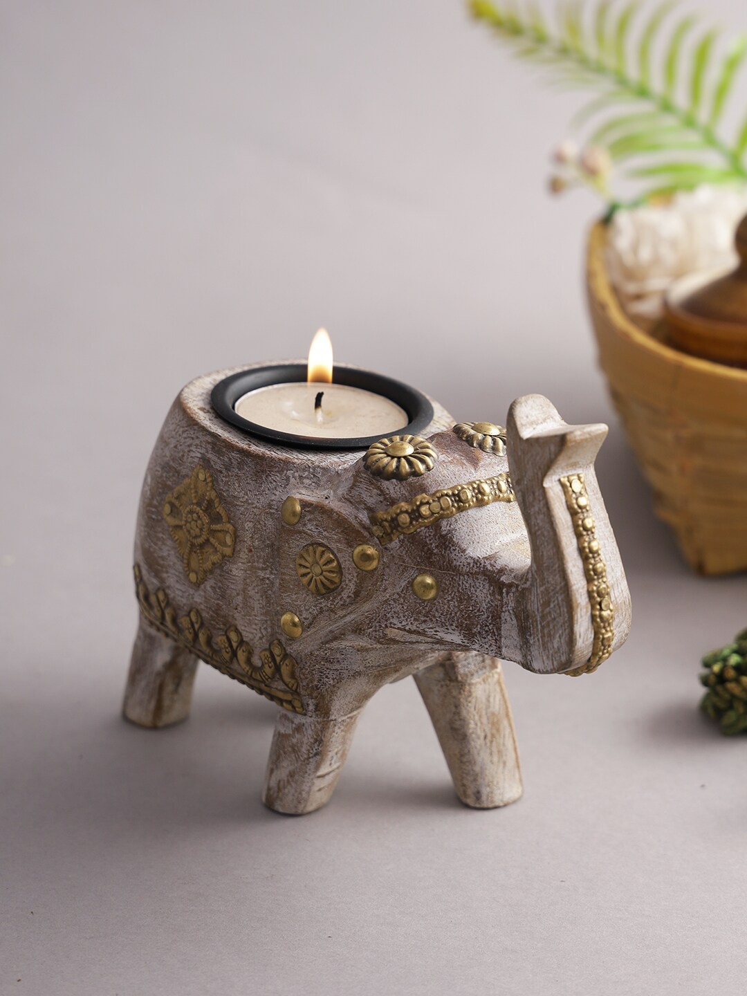 

Aapno Rajasthan Brown Elephant Wood Candle Holders