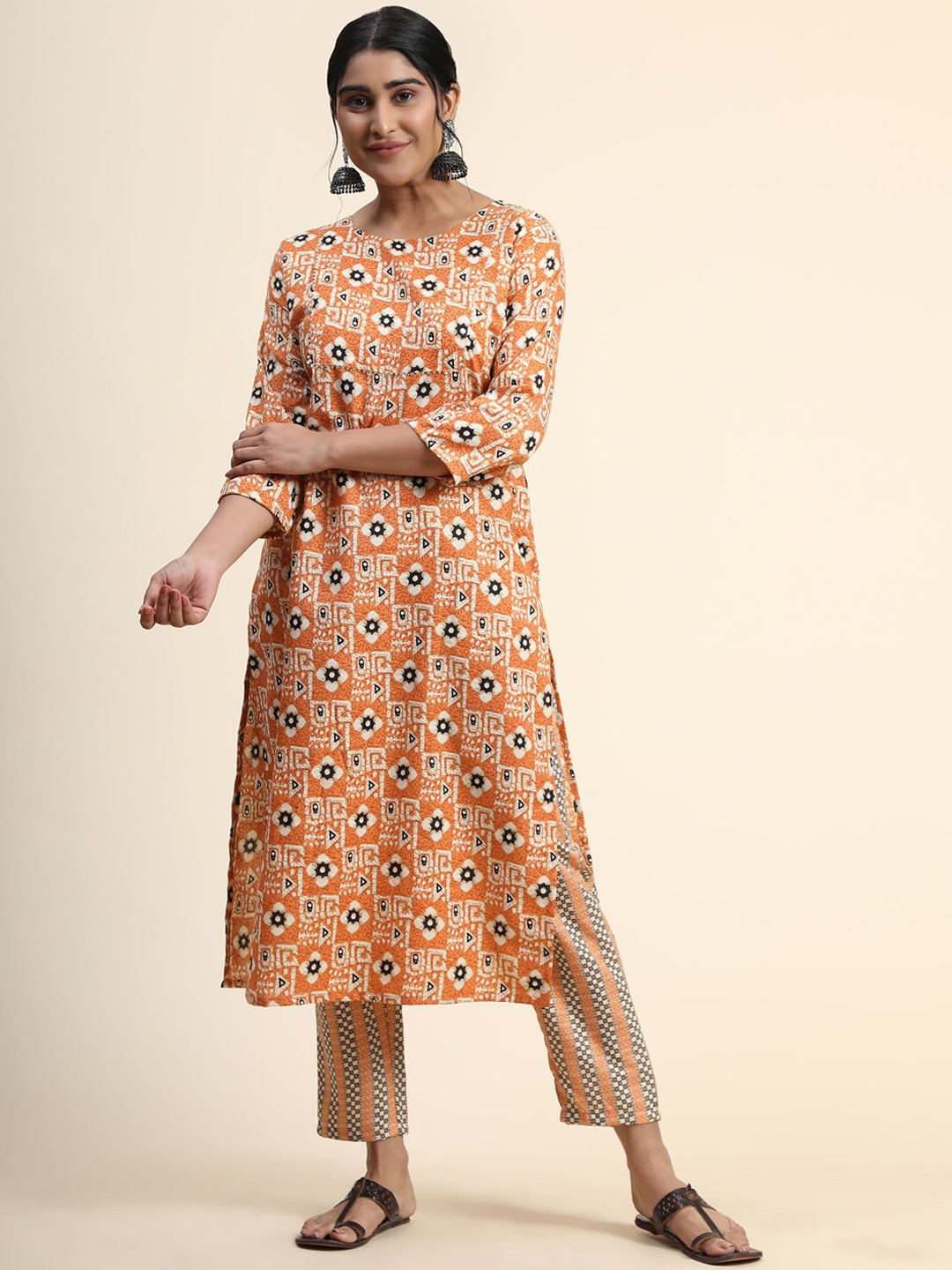 

KALINI Women Orange Floral Printed Kurti with Palazzos