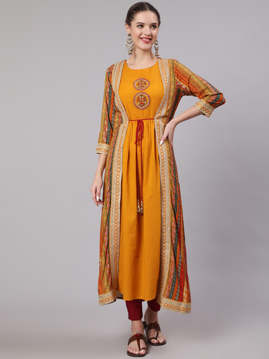 

Nehamta Women Ethnic Motifs Embroidered Thread Work Kurta With Shrug, Mustard
