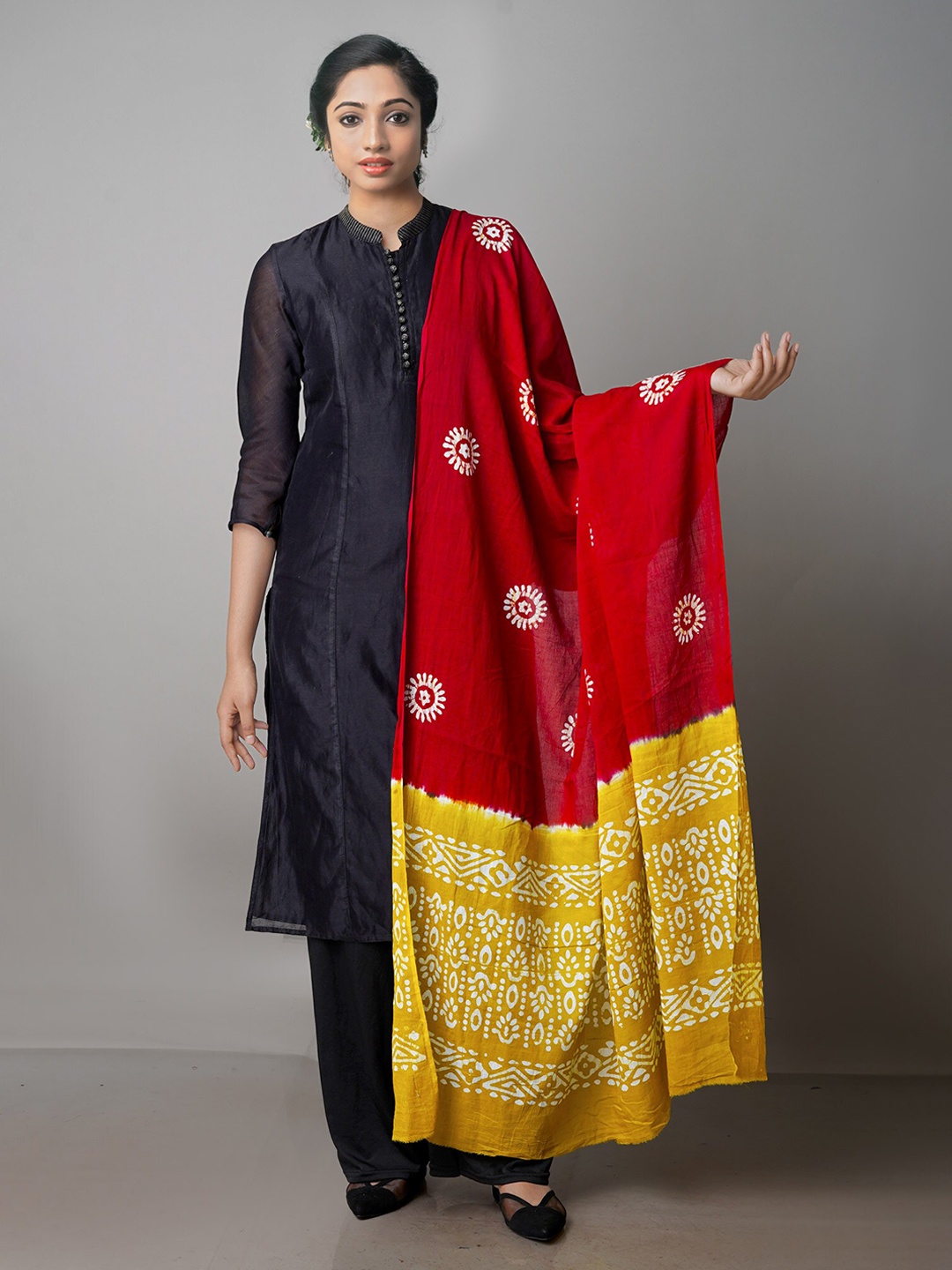 

Unnati Silks Yellow & Red Ethnic Motifs Dyed Pure Cotton Batik Dupatta