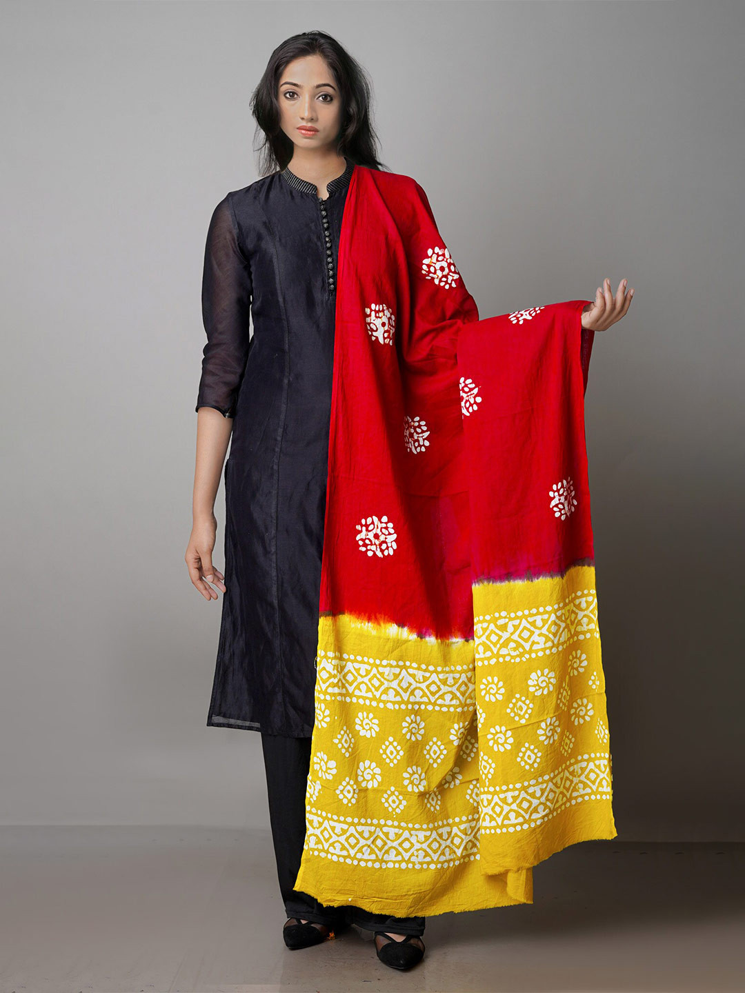 

Unnati Silks Yellow & Red Ethnic Motifs Dyed Pure Cotton Batik Dupatta