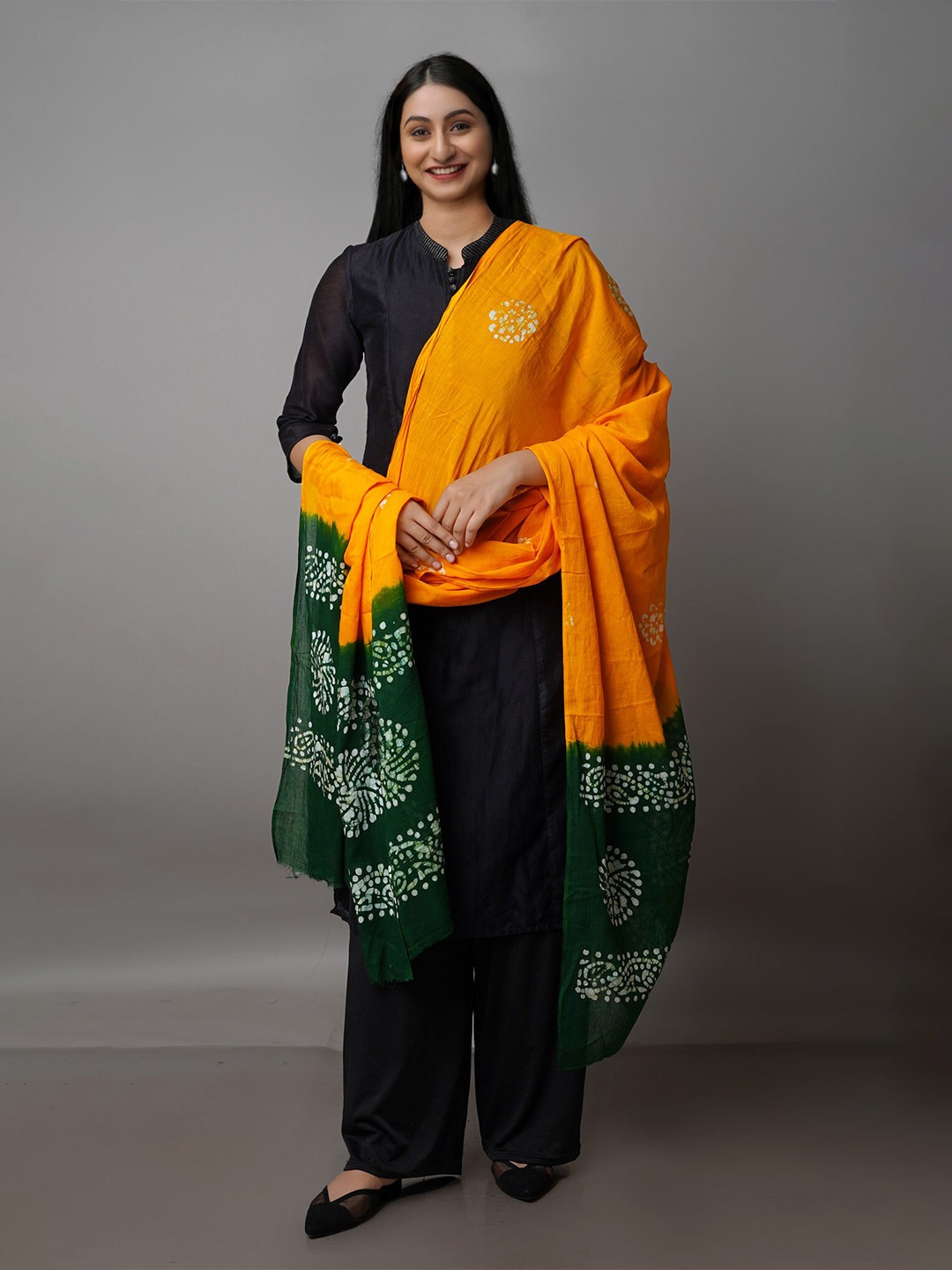 

Unnati Silks Yellow & Green Ethnic Motifs Dyed Pure Cotton Batik Dupatta